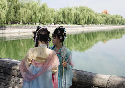 Checking the pose at the Forbidden City